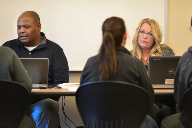 Eligibility specialists help residents apply for health insurance during a 2014 open enrollment.