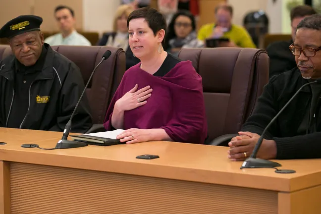 Veterans Services Program Supervisor Kim Douthit, center, addresses the Board
