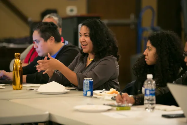 Lillian Ongelungel listens as Coalition members discuss concerns.