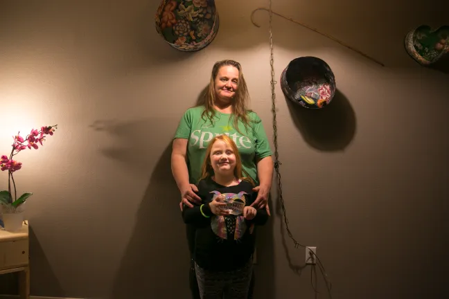 Stephanie Ramirez and her daughter Surri Noelle in their new apartment.