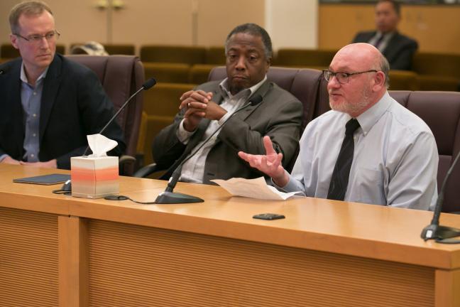 Multnomah County Health Department Community Mental Health Program Manager Neal Rotman addresses the board at Thursday’s meeting. Also pictured, Director of the Joint Office of Homeless Services Marc Jolin (left) and Senior Property Management Specialist 