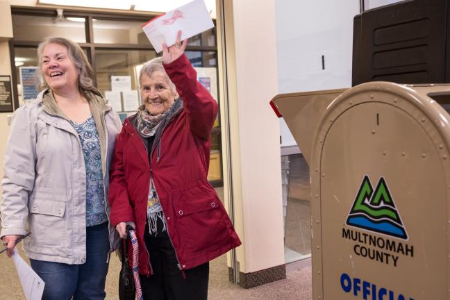 Tracy Marshall and her 94-year-old mother, Marceline Clark dropped off ballots at the Voting Center Express in Gresham on Election Tuesday