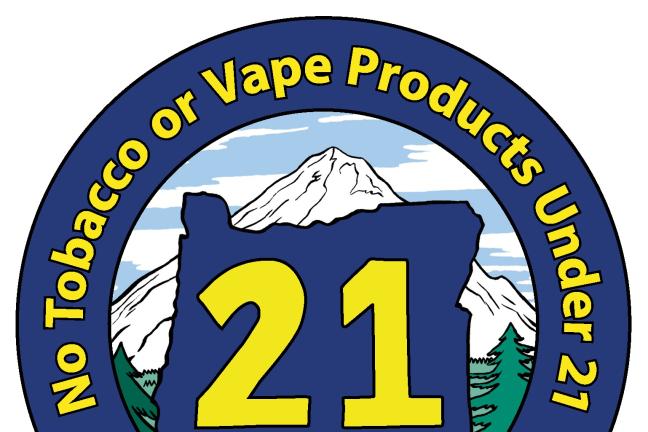 New decal for tobacco vendors, notifying the public that the legal age to purchase is now 21.