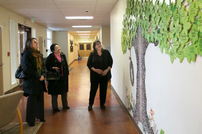 Cathe Wiese shows Chair Deborah Kafoury (left) and Commissioner Lori Stegmann (center) around My Father’s Place, a faith-based, non-profit family shelter in Gresham.
