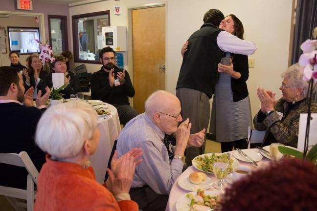 Chair Kafoury embraces Transition Projects Executive Manager George Devendorf at the Jean’s Place anniversary luncheon.  