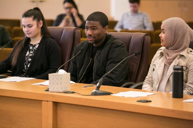 From left: Multnomah Youth Commissioners Charity Dunlevy-Todd; LaShawn McCarthy (speaking); and Balkhissa Noor