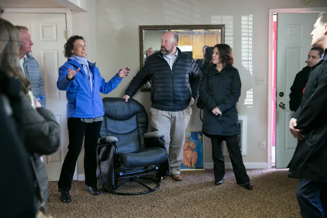 Rachel Solotaroff, CEO of Central City Concern, joins county officials on a tour of the vacant Budget Lodge motel.