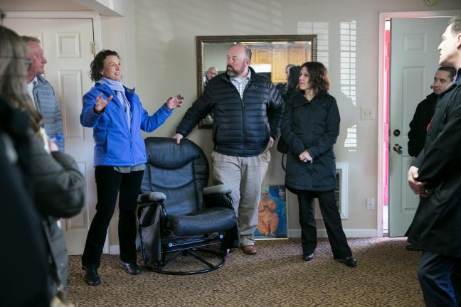 Rachel Solotaroff, CEO of Central City Concern, joins county officials on a tour of the vacant Budget Lodge motel.