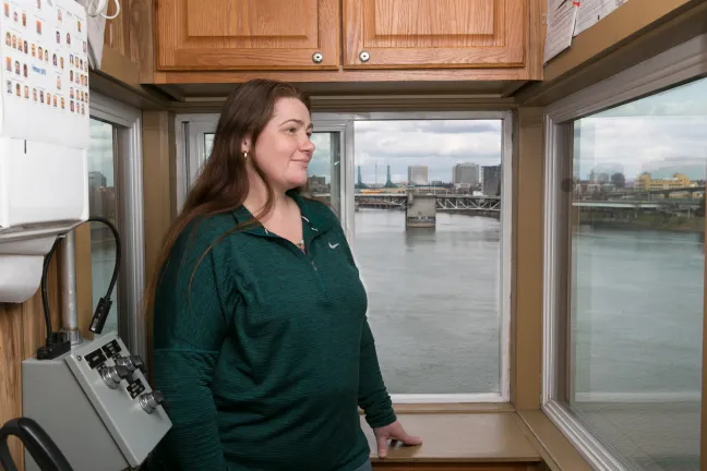 Tammy Vanderlinden surveys the Hawthorne Bridge and the Willamette River from her office in the operator's tower.