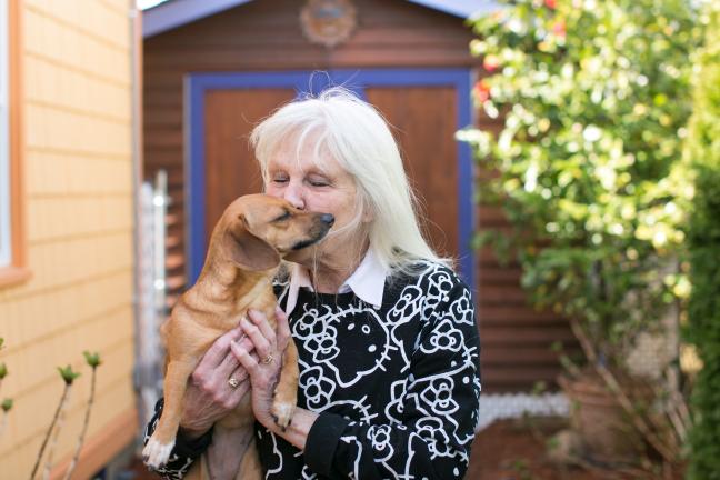 Sharon Newell and her therapy dog, Gracie.