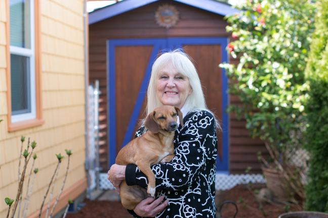 Sharon Newell and her therapy dog, Gracie.