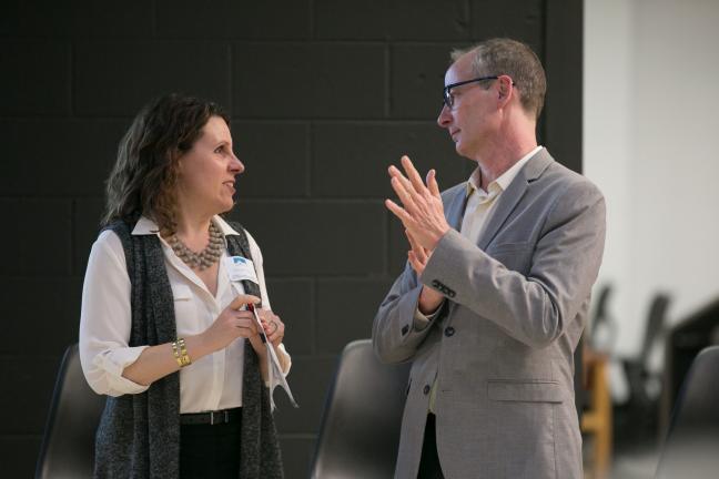 Chair Deborah Kafoury speaks with Metro Councilor Sam Chase during a discussion on reducing diesel emissions.