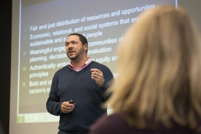 Chief Diversity and Equity Officer Ben Duncan talks to state employees during Public Health Week