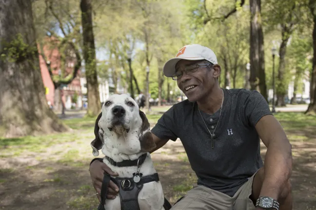 Luis Paterson and his dog Sugar have a roof for the first time in years after graduating from Latino Homebase Recovery