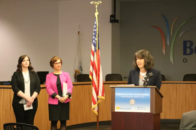 Commissioner Sharon Meieran (right) speaks at an April 23 press conference as Congresswoman Suzanne Bonamici (center) and community member Jessica Cardinal look on.