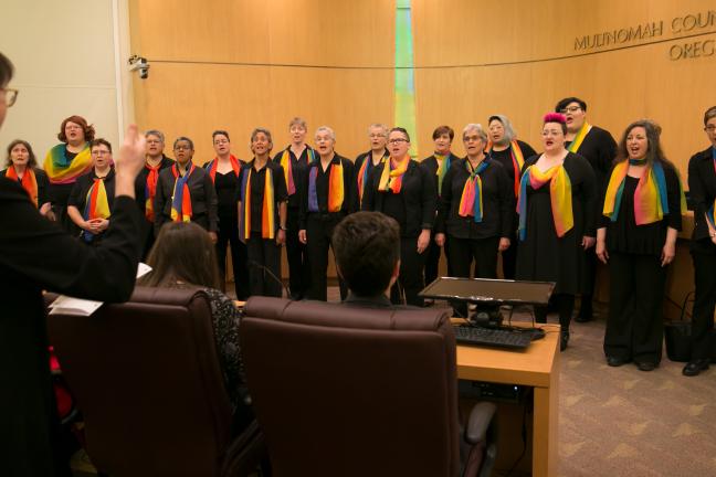 The Portland Lesbian Choir performs at the June 7 board meeting