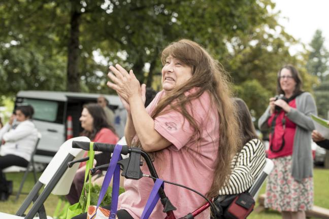 Dawna Burnett stops at her CSA pick-up to enjoy frittata and some music