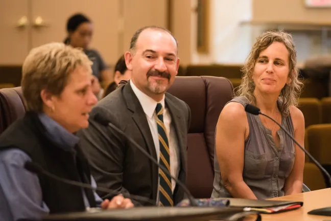 From left: Animal Services Director Jackie Rose, County Attorney David Blankfeld, and Andrea Kozil, community advocate