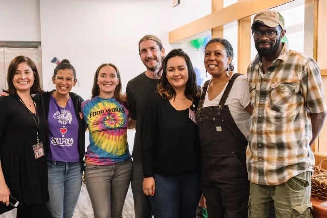 Farmers Arthur Shavers and Shantae Johnson, right, with their team from Mudbone Grown Farm deliver produce to clients at North Portland Health Center