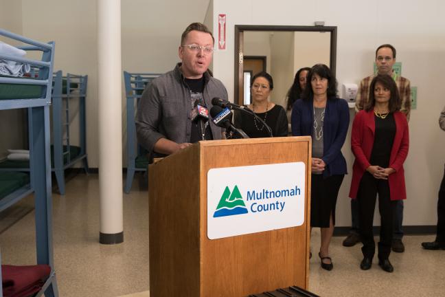 Andy Goebel of Portsmouth Union Church speaks at the Walnut Park shelter on Nov. 19, 2018.