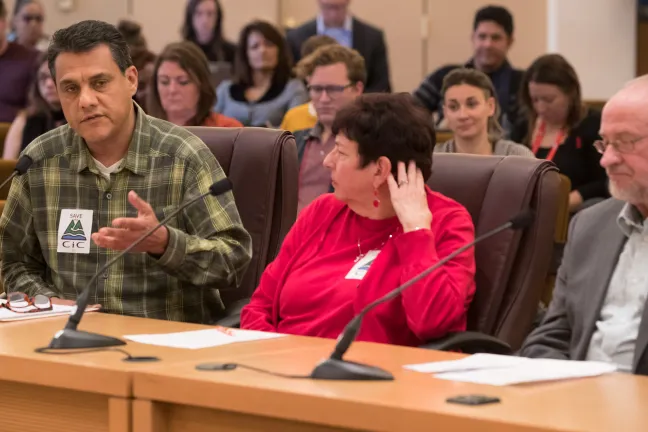 Former CIC members testify at the Board meeting.
