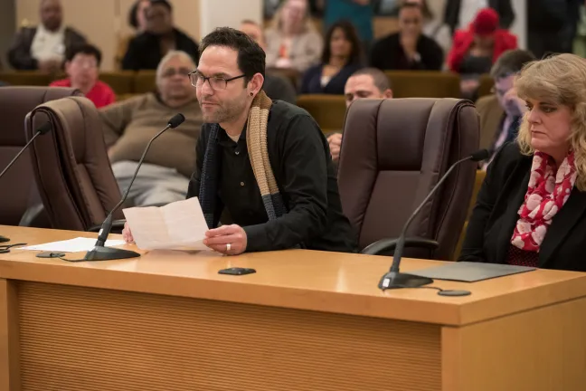 Jacob Mestman, a manager with the Health Department, acknowledged his role in perpetuating racism in his testimony and advocated for change.