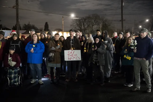At least 80 people took part in the Vigil of Remembrance and Solidarity.