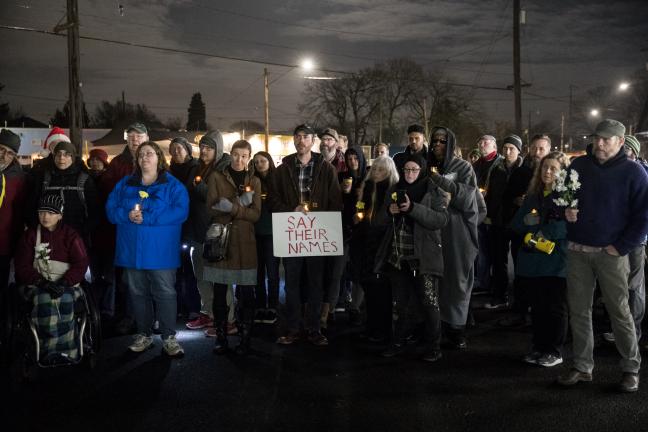 At least 80 people took part in the Vigil of Remembrance and Solidarity.