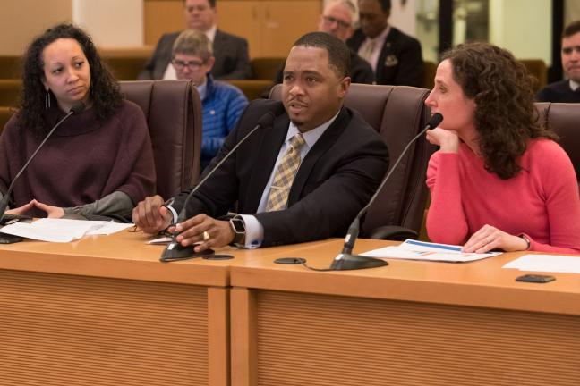 Frank Franklin, Ph.D., principal epidemiologist for Multnomah County, sharing data on chronic illness, alongside Public Health Director Rachael Banks, left, and Deputy Health Officer Dr. Jennifer Vines, right.