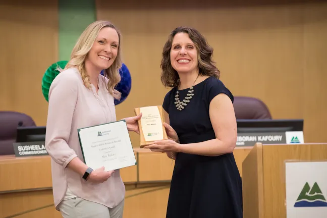 Chair Kafoury (right) presents the Superior Public Service to Internal Customers award to Mary Wallace of Corrections Mental Health Services