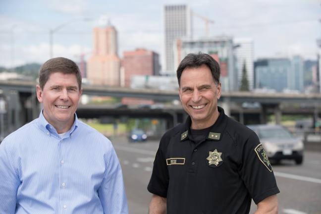 Sheriff Mike Reese, right, and Corrections Health Director Dr. Michael Seale have partnered to treat addiction in jail. partnered