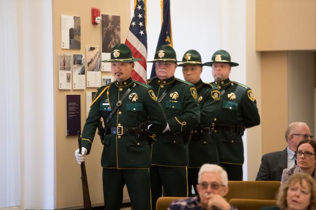 Honor Guard members present the nation's colors.