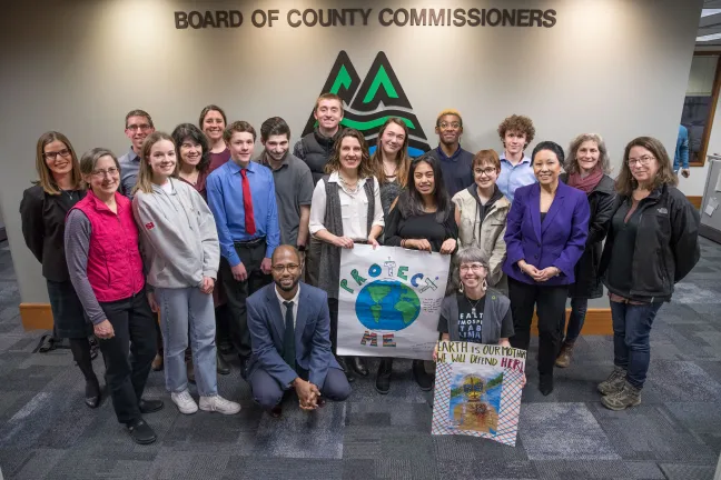Commissioners join young people at climate change press conference.