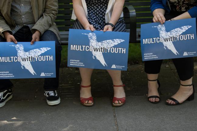 Signs say: Multco with Youth.