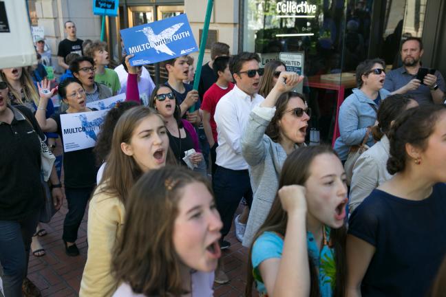 Chair Deborah Kafoury marches with youth and other commissioners.