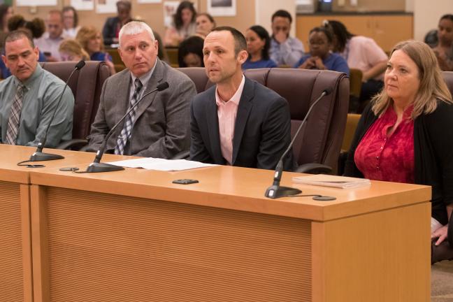 From left: Portland Police Bureau Captain Derek Rodrigues; PPB Sergeant Tim Musgrave; Brian Hughes of County Human Services; and Mary Joy of Lutheran Community Services brief the Board of County Commissioners on elder abuse