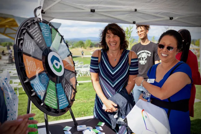 Commissioners Sharon Meieran, left, and Lori Stegmann stopped by to chat with providers from Cascadia Behavioral Health