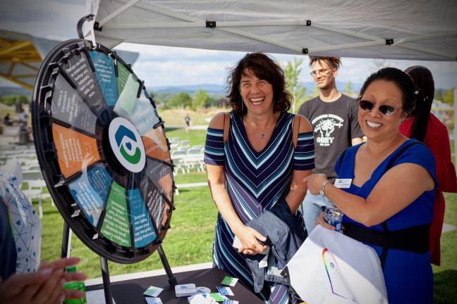 Commissioners Sharon Meieran, left, and Lori Stegmann stopped by to chat with providers from Cascadia Behavioral Health