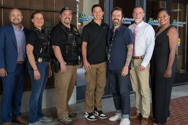 Members of Multnomah County's Mental Health Unit pose for photo after Pretrial, Probation and Parole Supervision Week proclamation.
