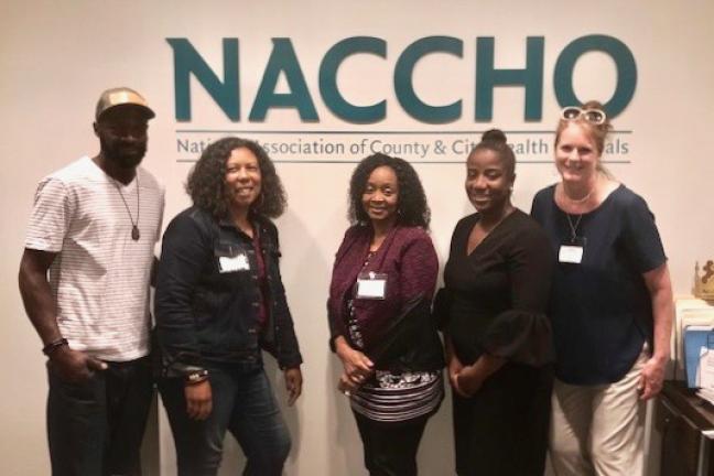 Farmers Arthur Shavers and Shantae Johnson, left, joined the County's Tameka Brazile, Charlene McGee and Kimberly Pidcoke