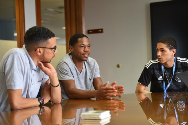 From left: Lakayana Drury, Sema’J Wade and Amarien Simmons talk about their third year in the Word is Bond program.