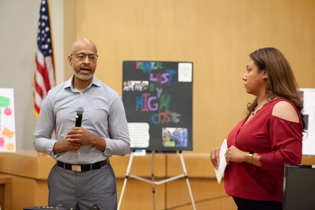 From left: Corrections Counselor Bruce Douglas and Parole and Probation Officer Tomasina Tavai-Porotesano