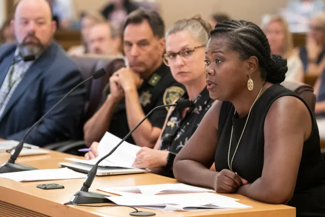 Erika Preuitt, interim director for the Department of Community Justice speaks to board.