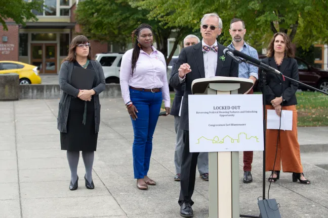Rep. Earl Blumenauer, front-center, speaks alongside Commissioner Chloe Eudaly, from left, Nkenge Harmon-Johnson, Ernesto Fonseca, Michael Buonocore and Chair Deborah Kafoury on Thursday, Sept. 5, 2019.
