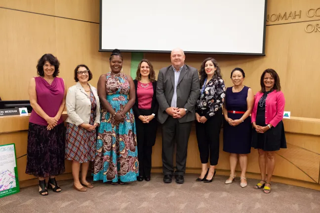 Multnomah County board members pose with newly appointed County directors Erika Preuitt, Department of Community Jusitce and Bob Leek, Department of County Assets.