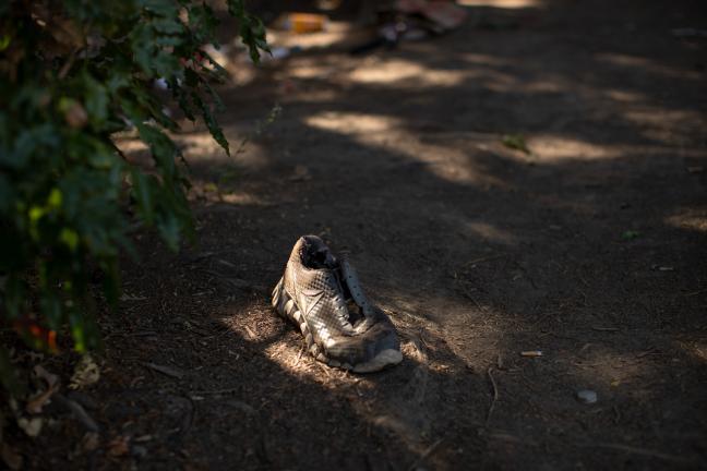 An abandoned shoe on a foot trail near I-405 where Andy died.