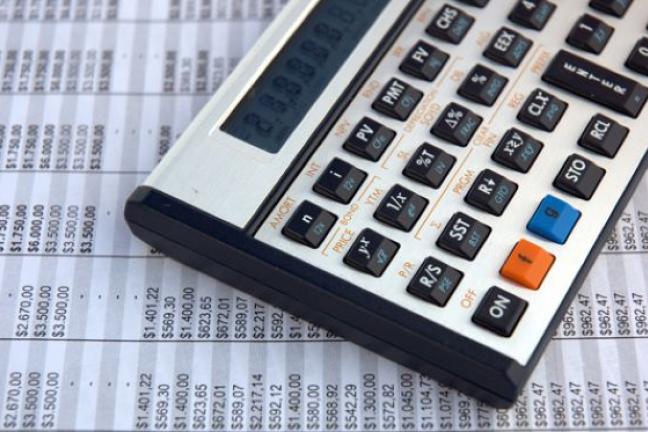 picture of calculator and salary spreadhsheet