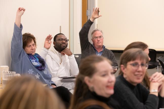 Barb Ranish, left, along with Mario Odighienwa and Jason Renaud offer feedback on the design on a downtown behavioral health resource center