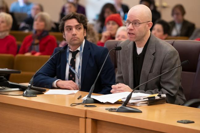 Chris Voss, director of Multnomah County’s Office of Emergency Management, right, testifies alongside John Wasiutynski, director of the County’s Office of Sustainability