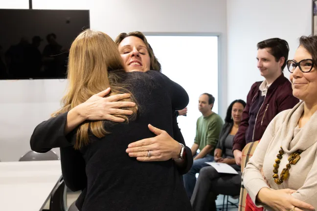 Chair Deborah Kafoury embraces a participant at the Laurelwood Center on Friday, Dec. 6, 2019.
